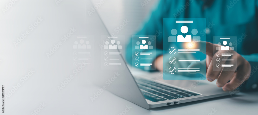 Naklejka premium Digital recruitment and talent management concept showing a professional selecting employee profiles through an online platform, representing hiring, human resources, staffing, workforce technology.