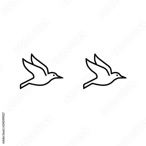 Foto 白い背景に飛んでいる2羽の鳥のシンプルなライン