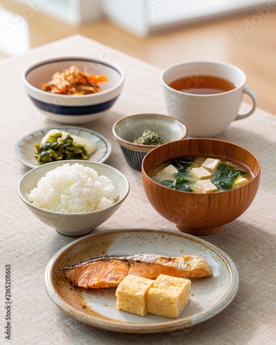 japanese breakfast set with grilled salmon, rice, dashimaki, natto, and miso soup