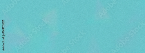 Abstract grainy turquoise background with subtle soft color gradients.