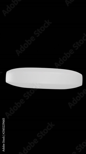 Animation of floating pill on black background