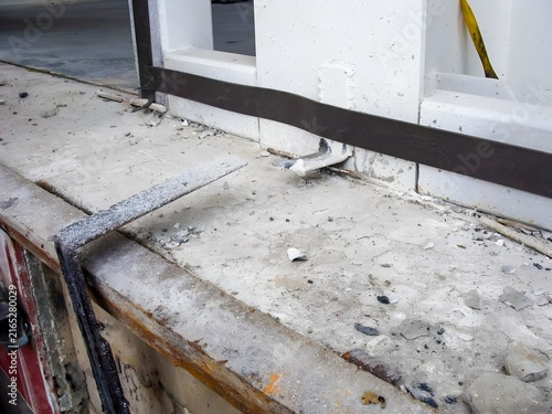 Construction site detail showing sandwich panels and concrete floor during warehouse processing