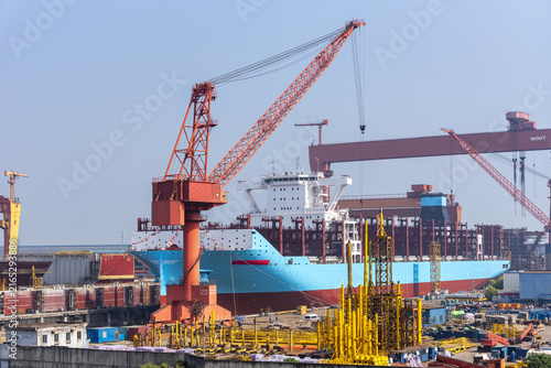 View on the container ship being built at shipyard facilities. The vessel represents modern dual-fuel technology supporting methanol-powered maritime transport.
