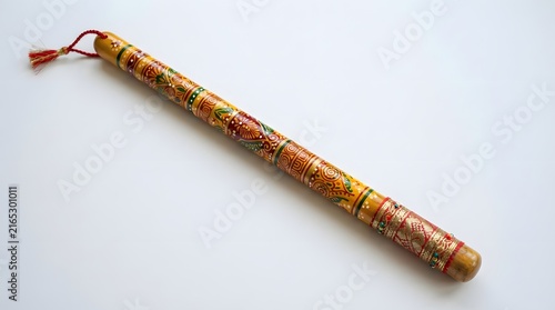Traditional indian dandiya stick isolated on white background