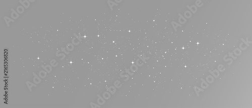 Obraz na plátne Glittering white stars and fine stardust particles floating in a wide dark space