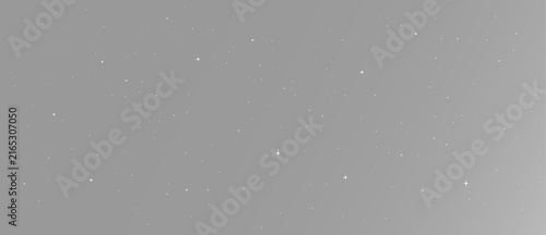 Sparse star field with glowing white points and brilliant sparkles scattered through a panoramic black space with subtle silver dust