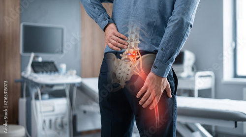 Sciatica pain with lumbar spine and sciatic nerve inflammation, medical healthcare concept