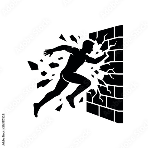 Silhouette of a man breaking through a brick wall symbolizing overcoming obstacles and achieving success.