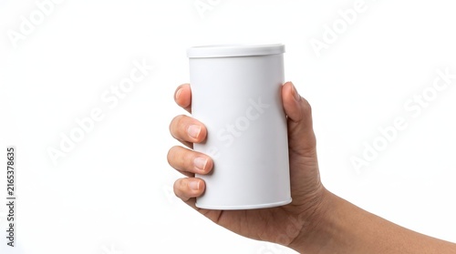 A hand holding a blank white cylindrical container against a white background.