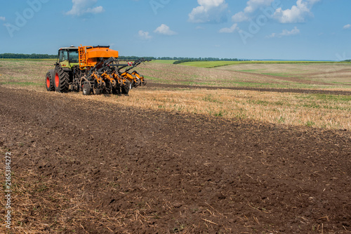 the sowing complex is aggregated with a tractor, during strip tillage (Strip-till) and simultaneous sowing on a stubble field