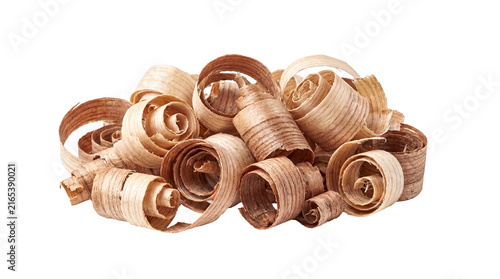 Obraz na plátně A neatly arranged pile of diverse wood shavings, showcasing rich dark and light brown tones with intricate curls