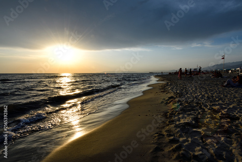 Eclipse Over Silhouetted seascape Tuscany  