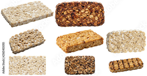 Fotografie A collection of tempeh slices showing different toasted, smoked, and plain textures for ingredient and cooking use