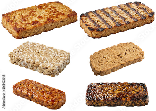 Konstfotografi A collection of tempeh slices showing different cooking and marinating styles with varied textures and browning