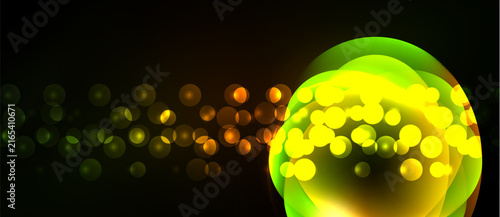 Bild auf Leinwand Bright yellow, green bokeh effects dominate dark background