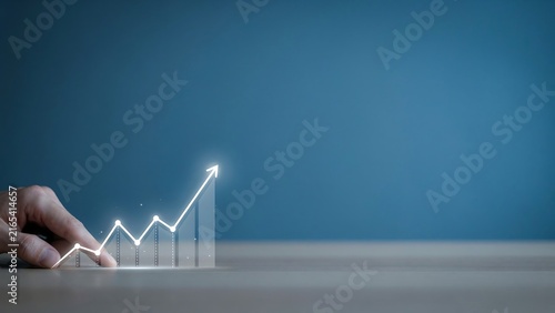 A person pushing a glowing digital arrow upwards on a financial chart representing successful business growth and investment progress