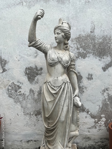Принти на полотні Neoclassical white marble statue of female allegorical figure against weathered