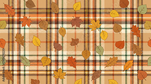 Autumn leaves on beige plaid pattern for Thanksgiving background