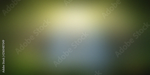 Abstract green and yellow gradient background with soft light diffusion.