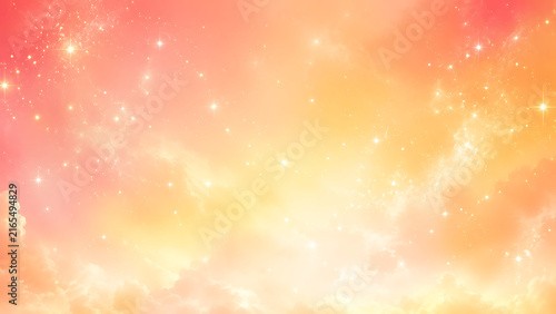 Soft abstract background with glowing pink and orange gradients and sparkling light.