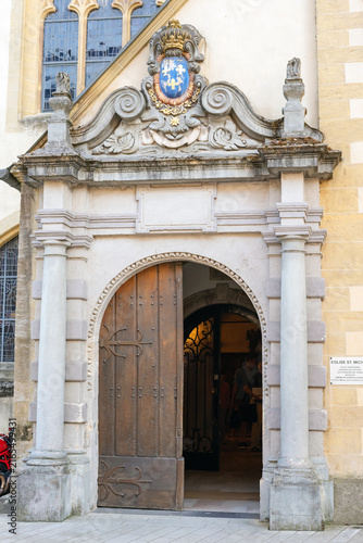 Luxembourg, 28 June 2019: Historical buildings in Luxembourg city center. Carved portal of the Church of St. Michael (Église Saint-Michel) in Luxembourg