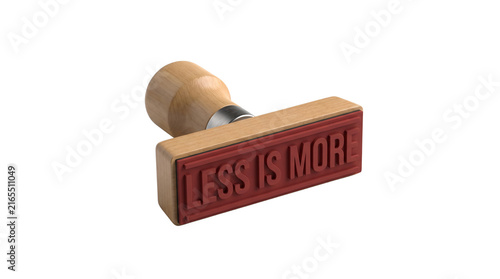 Wooden rubber stamp with the phrase Less Is More.