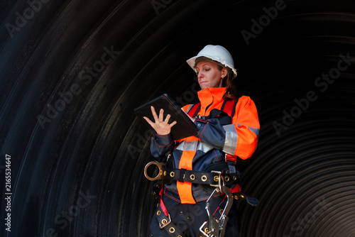 Industrial engineers who inspect large utility pipes inside or in tunnels used for water systems.