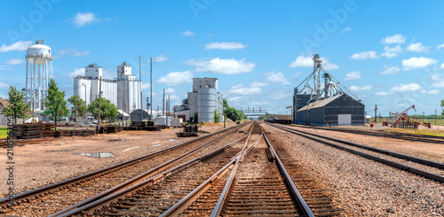 Railway system positioned through an aggregate processing facility