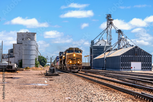 Train moving through industrial aggregate plant