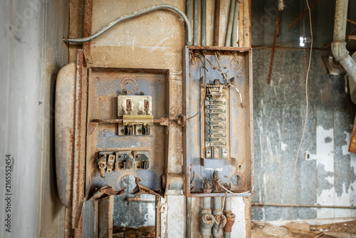 Bild auf Leinwand Antiquated power electrical panel inside of an abandoned business