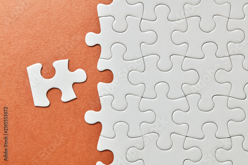 Obraz na plátně Incomplete puzzle with separate piece