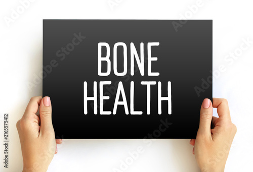 Fotografía BONE HEALTH text on sign held by hands