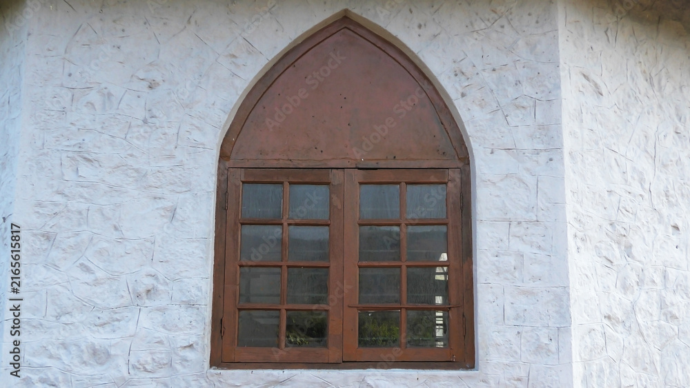 Fototapeta premium Closeup of an arch model traditional old window of an ancient building