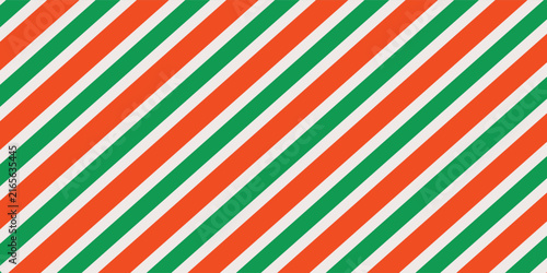Christmas seamless pattern. Red and green diagonal stripes background. Candy cane repeating decoration wallpaper. Winter holiday lines backdrop. Xmas peppermint present wrapping print design. Vector
