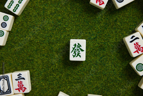 Photography Mahjong Tiles on Green Felt Table