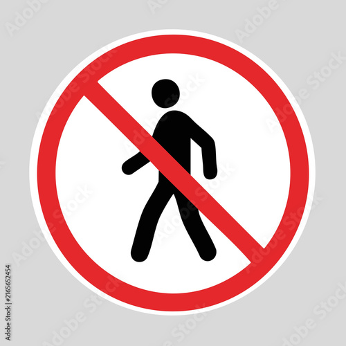 Obraz na płótnie No walking prohibition sign with a pedestrian silhouette crossed out by a red circle and diagonal slash