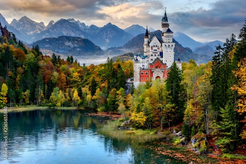 Fairytale castle lakeside autumn mountains