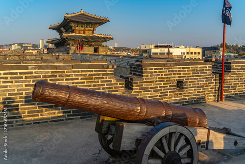 View of cannon and Janganmun Gate during daytime in autumn, Paldal-gu, Suwon-si, Gyeonggi-do, South Korea