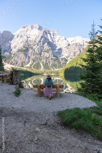 Quadro su tela Woman enjoying breathtaking view of Lake Braies in Dolomites, Italy