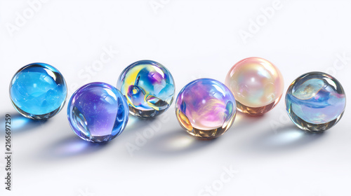 Set of colorful transparent glass spheres or marbles isolated on a white background