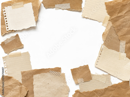 Torn paper collage border with kraft paper and notebook scraps
