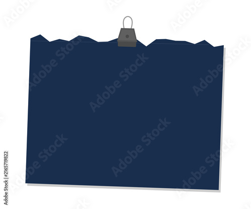 Obraz na plátně Dark blue torn paper sheet held by a metal binder clip, blank space for text or