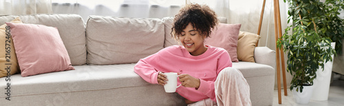 Obraz na plátne Relaxing moments at home for a beautiful young woman in cozy surroundings