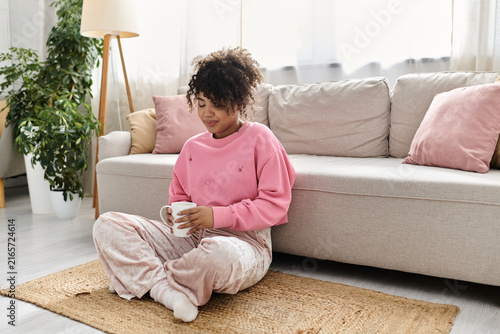 Konstfotografi Relaxing at home with a warm drink on a cozy afternoon