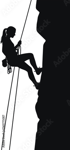 Woman rock climbing on cliff face silhouette with climbing mountain adventure silhouette