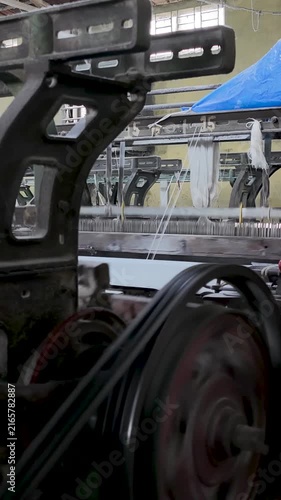 Mechanical Weaving Machine Parts In Textile Factory vertical view