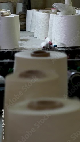 Rows Of Yarn Spools In Textile Factory