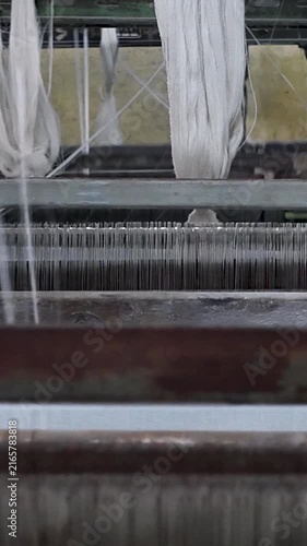 Textile Mill Loom With Warp Threads Close-up vertical view