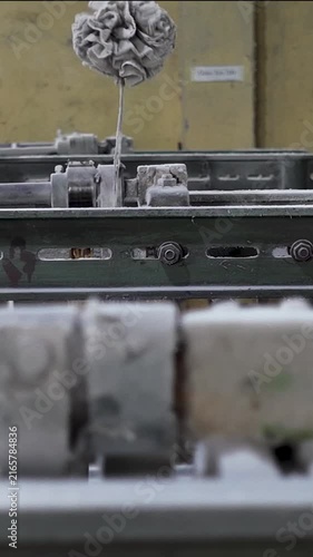 Close-up Of Yarn Bobbins On Textile Machine