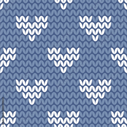 Blue and White vector Seamless Knitted Pattern Background with White Geometric Heart Shapes for Winter Textile Design
